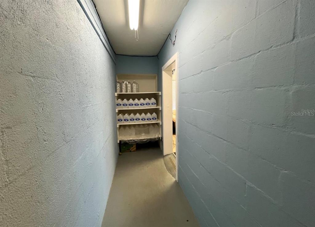 2315 West Old US Highway 441 Mount Dora, FL 32757 - Photo 18 of 19 a view of a closet area with a bathroom