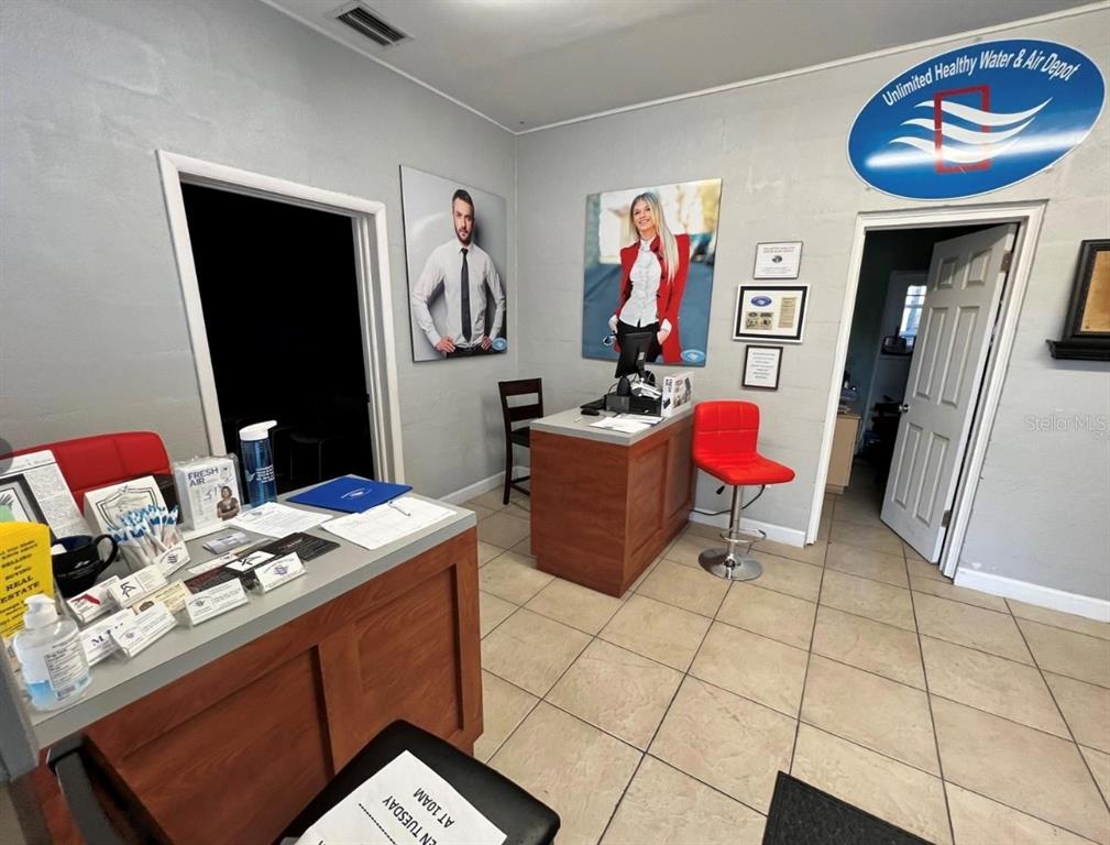 2315 West Old US Highway 441 Mount Dora, FL 32757 - Photo 8 of 19 a workspace with furniture and wall paintings