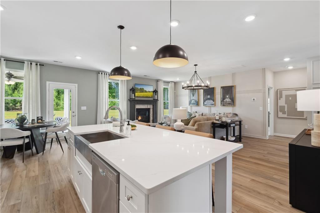 412 Hartsfield Road McDonough, GA 30252 - Photo 23 of 43 a large kitchen with a table and chairs