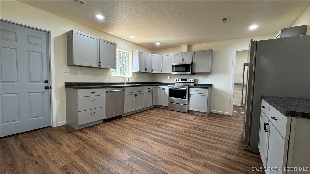 711 South Grand Avenue Eldon, MO 65026 - Photo 1 of 22 Spacious kitchen with LVP flooring, Maytag applian