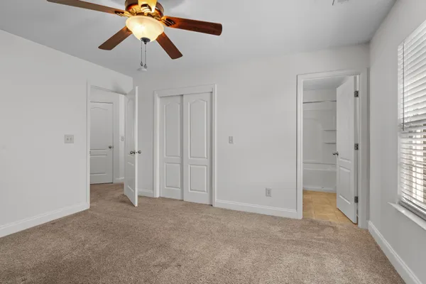 a view of an empty room and window