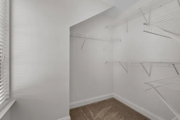 a view of a room with racks on the wall
