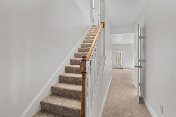 a view of an entryway with stairs