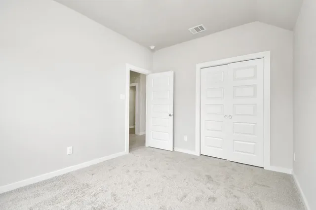an empty room with closet