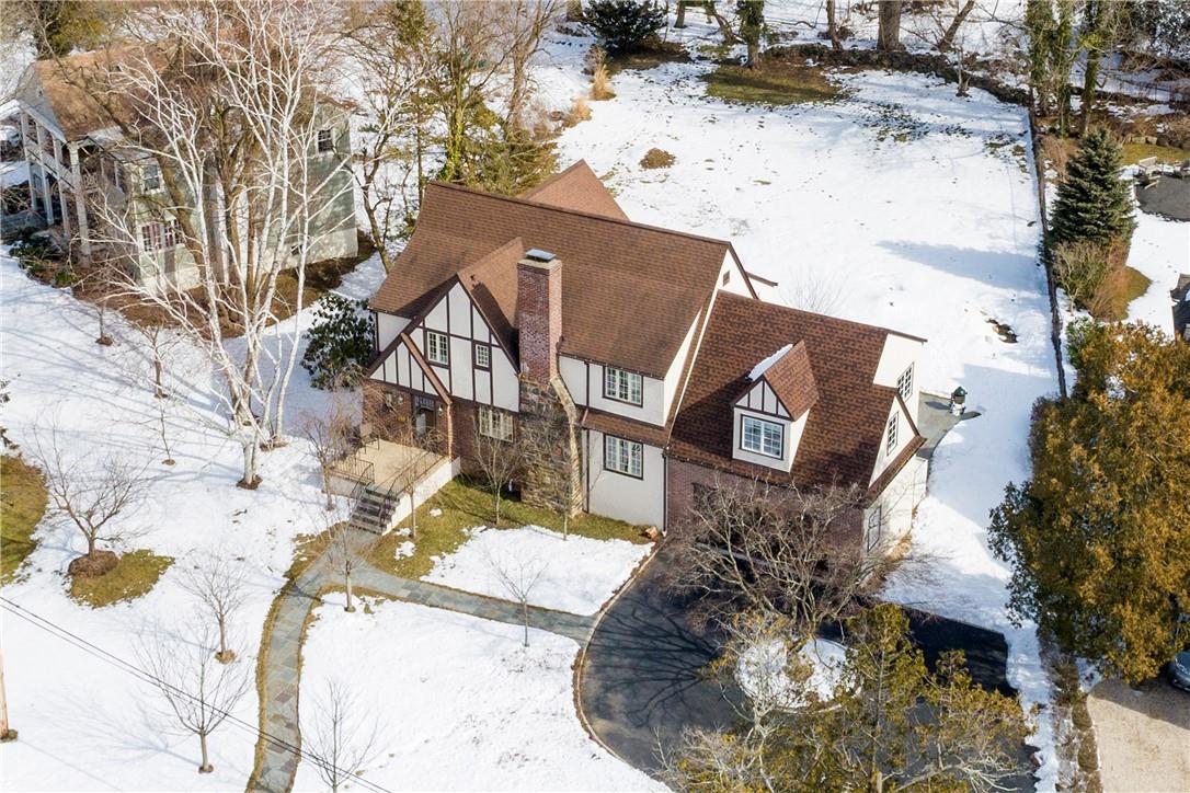85 Valley Road New Rochelle, NY 10804 - Photo 1 of 1 a view of a house with snow on the background