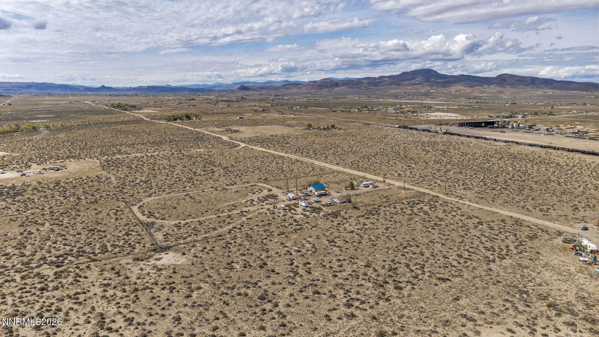 3720 Lemon Street Silver Springs, NV 89429 - Photo 16 of 23 a view of an ocean beach and mountain