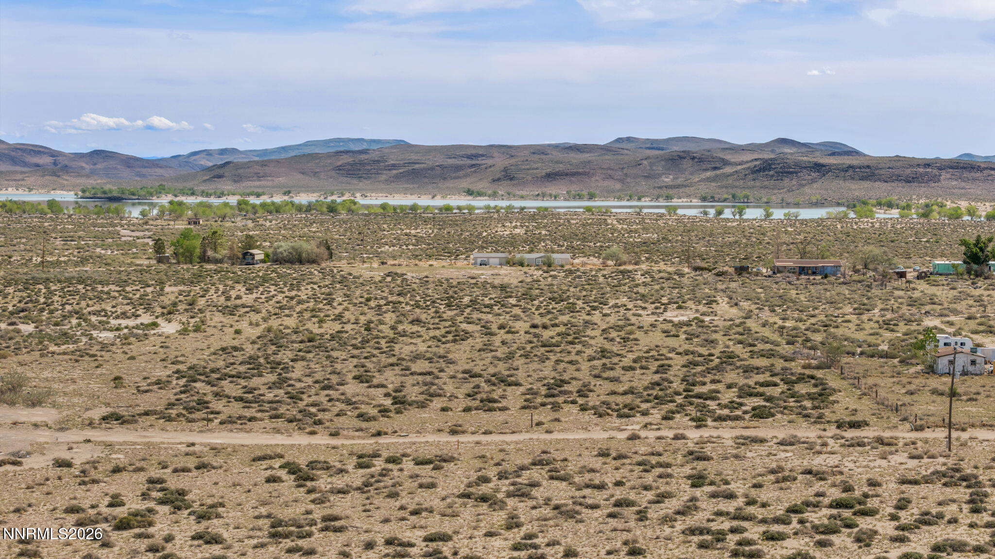 3720 Lemon Street Silver Springs, NV 89429 - Photo 4 of 23 a view of an ocean and a mountain