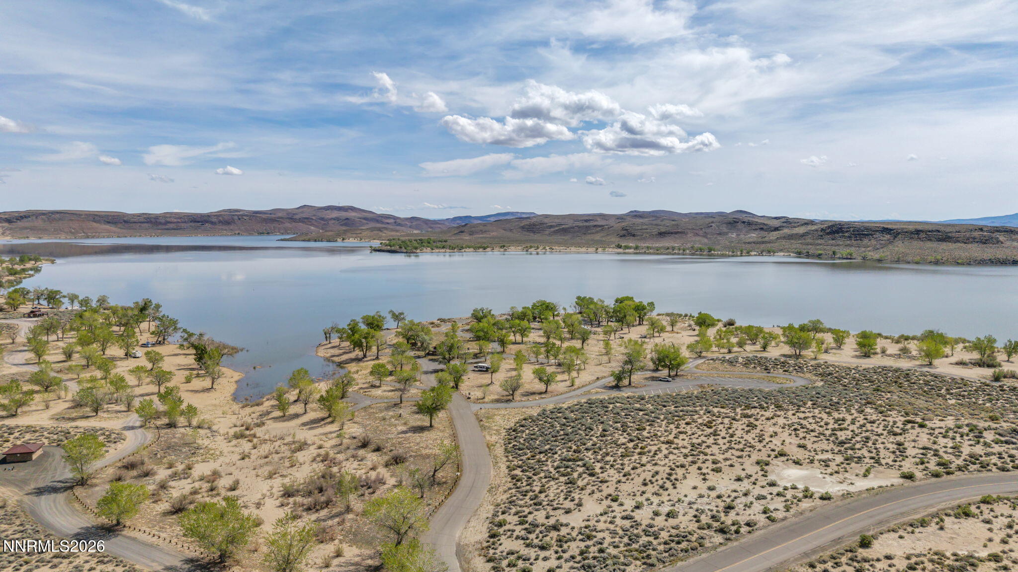 3720 Lemon Street Silver Springs, NV 89429 - Photo 9 of 23 a view of a lake with a mountain