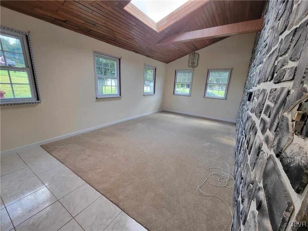 101 Ramblewood Drive Easton, PA 18040 - Photo 11 of 27 Great Room with Stone Accent Wall