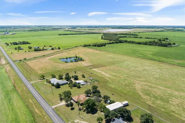 a view of a lake with a big yard