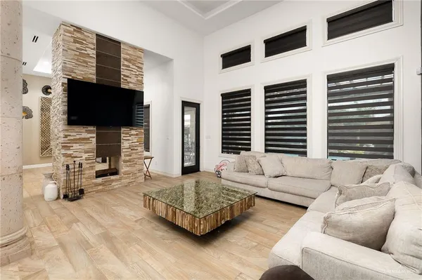 a kitchen with a sink cabinets and stainless steel appliances