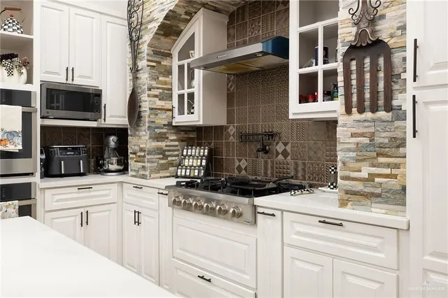 a bed room with a bed and a ceiling fan