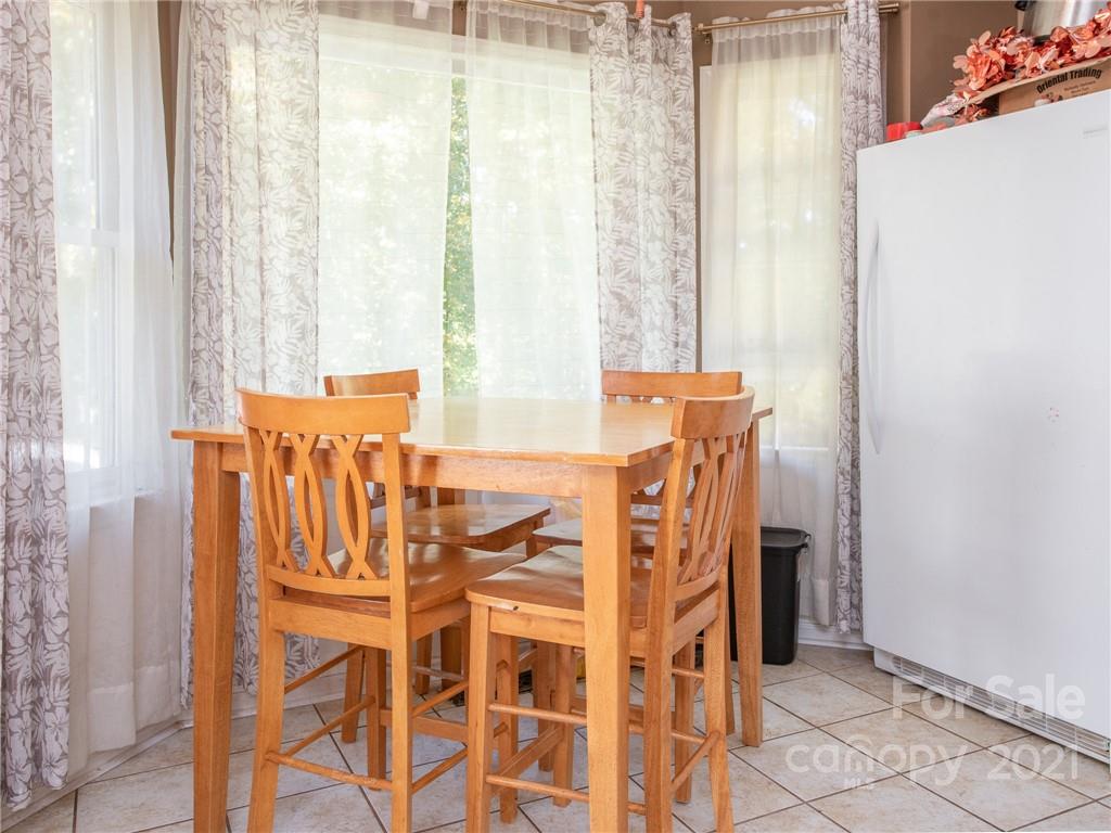 128 Altan Ridge Drive Monroe, NC 28112 - Photo 19 of 42 a dining room with furniture and window