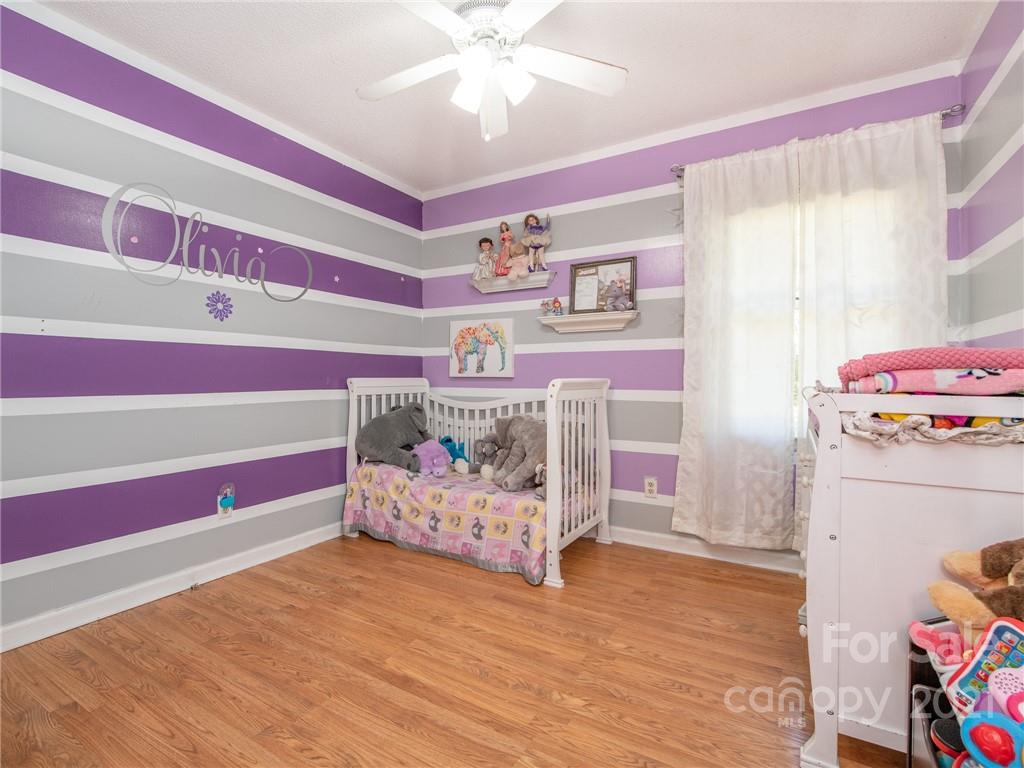 128 Altan Ridge Drive Monroe, NC 28112 - Photo 25 of 42 a bed room with a bed and a window