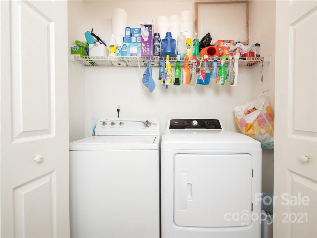 128 Altan Ridge Drive Monroe, NC 28112 - Photo 29 of 42 a utility room with dryer and washer