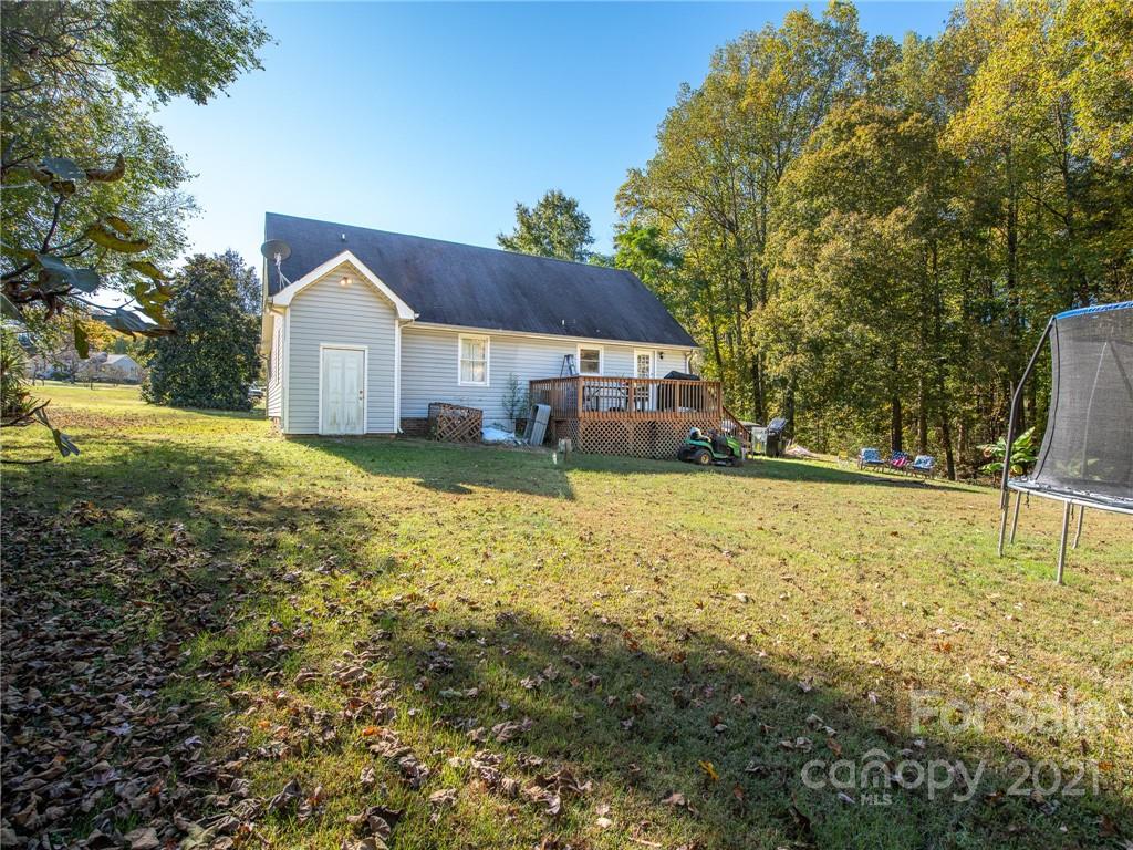 128 Altan Ridge Drive Monroe, NC 28112 - Photo 34 of 42 a view of a house with a yard