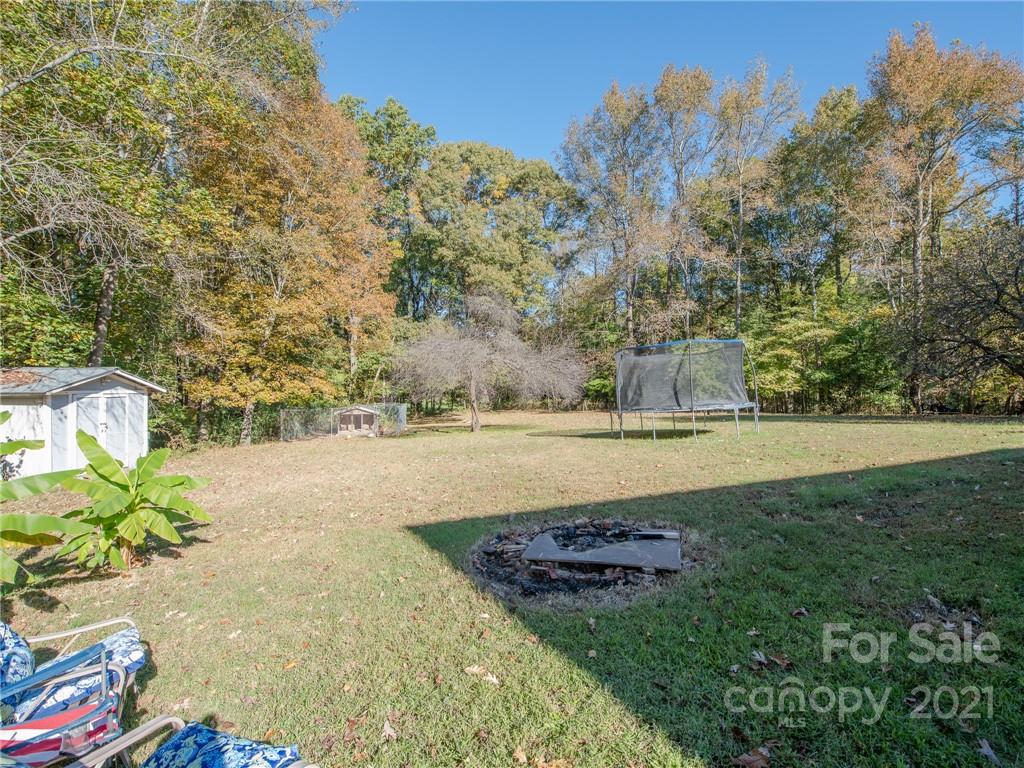 128 Altan Ridge Drive Monroe, NC 28112 - Photo 37 of 42 a view of a garden with trees