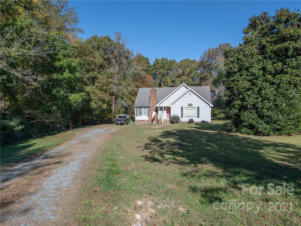 128 Altan Ridge Drive Monroe, NC 28112 - Photo 42 of 42 a view of a house with a yard