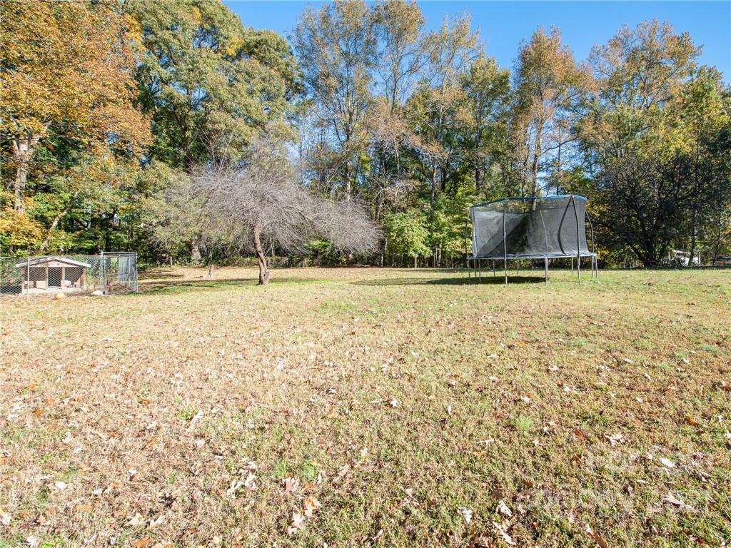 128 Altan Ridge Drive Monroe, NC 28112 - Photo 8 of 42 a view of a yard with an outdoor space