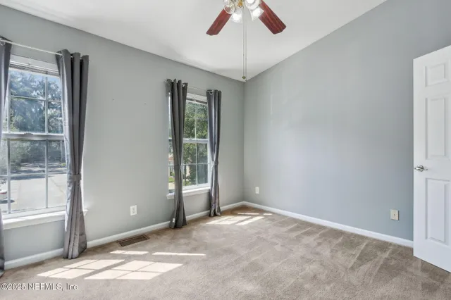 a view of a bathroom with a bathroom