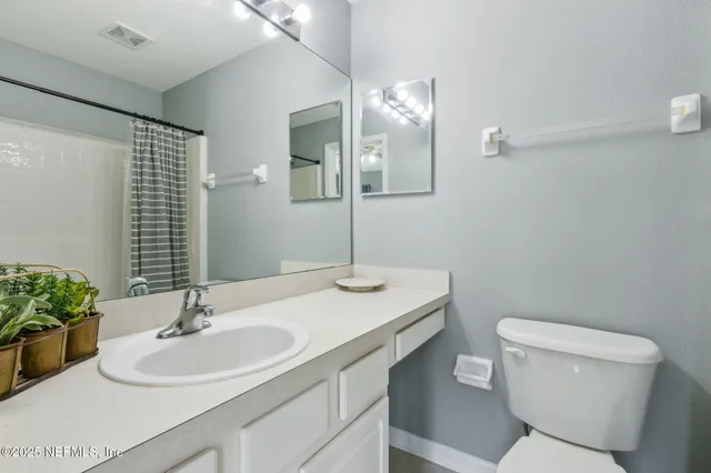 a view of a two chair in the balcony