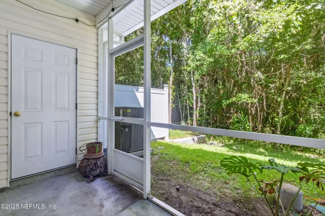 a view of a porch with a yard