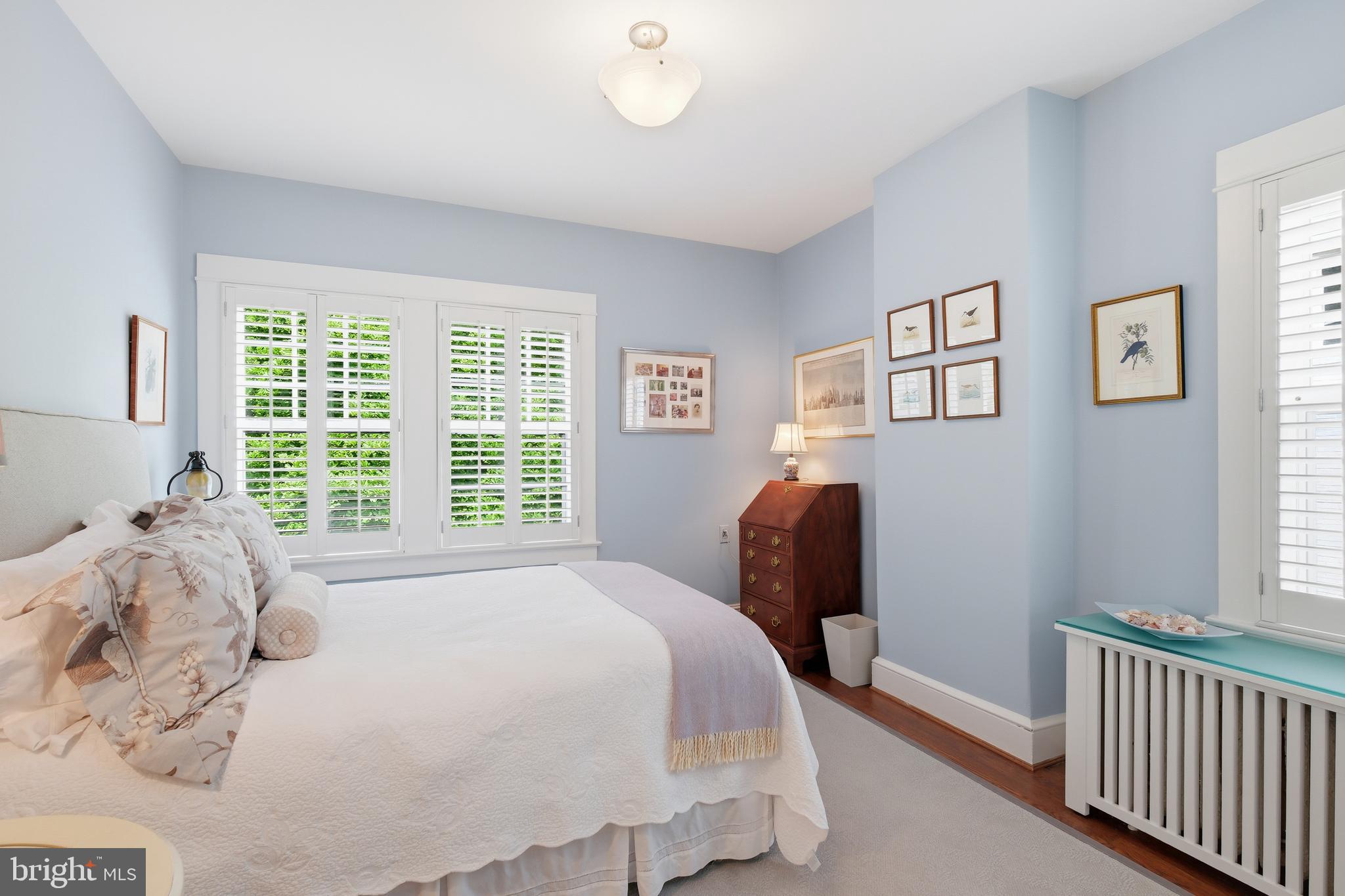 6411 33rd Street Northwest Washington, DC 20015 - Photo 33 of 48 a bedroom with a bed and a window