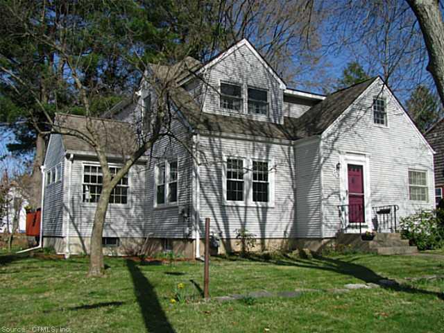 86 Phelps Road Manchester, CT 06042 - Photo 1 of 1 front view of house with a yard