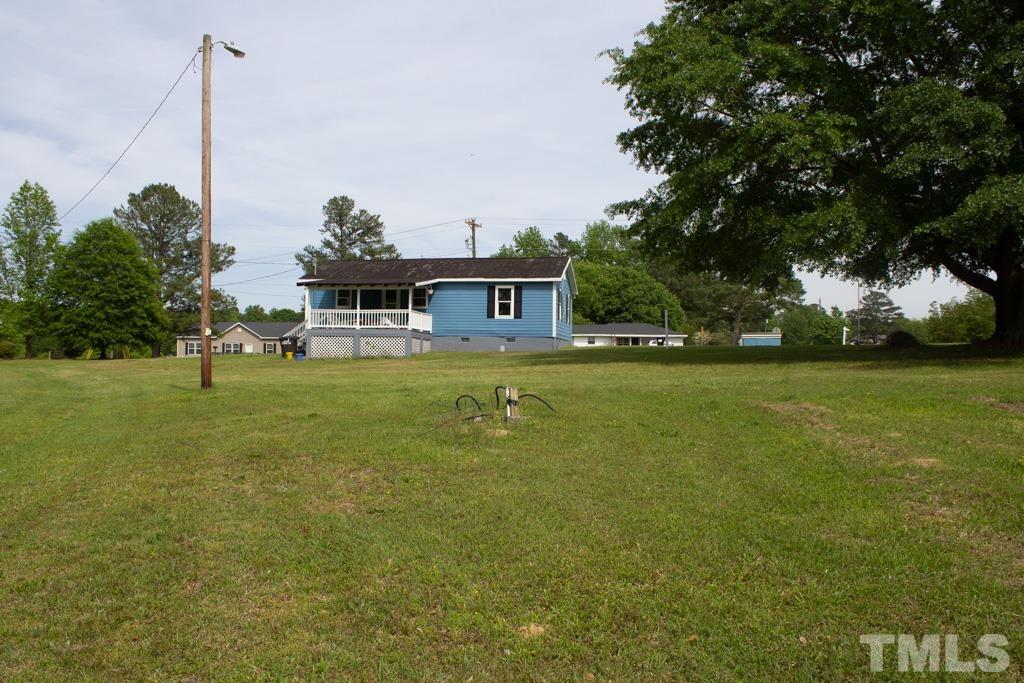 9592 Kennebec Road Willow Spring, NC 27592 - Photo 5 of 14 a view of a garden