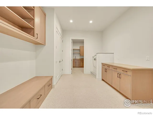 a view of a kitchen with cabinets