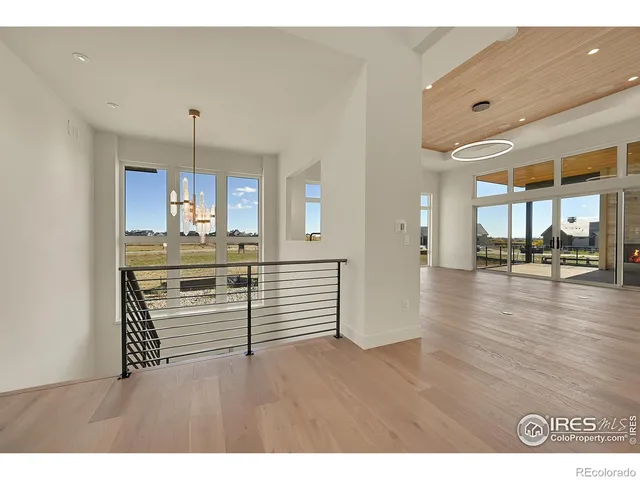a view interior of a house and kitchen view with wooden floor