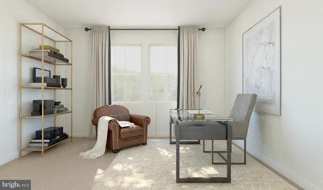 a workspace with furniture and a window