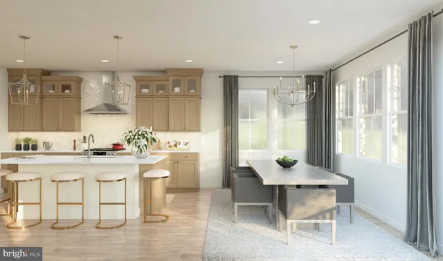 a kitchen with a sink and chairs