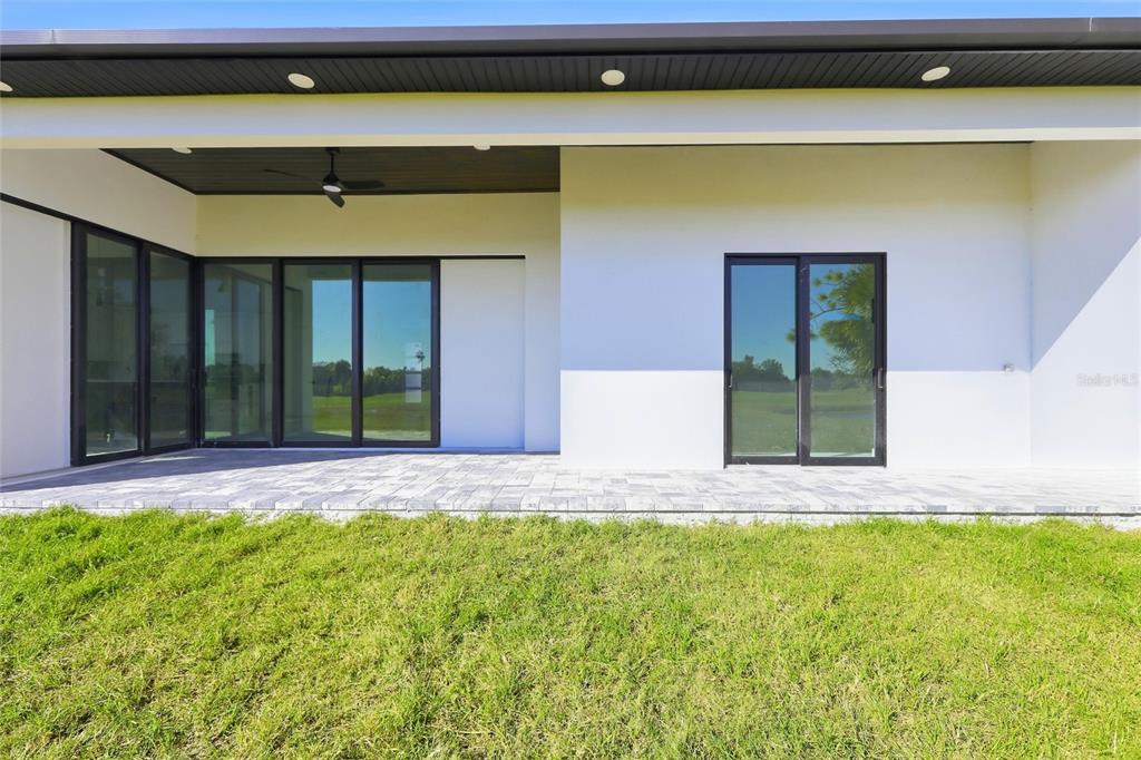 17 Long Meadow Road Rotonda West, FL 33947 - Photo 30 of 37 a view of a house with a backyard and window
