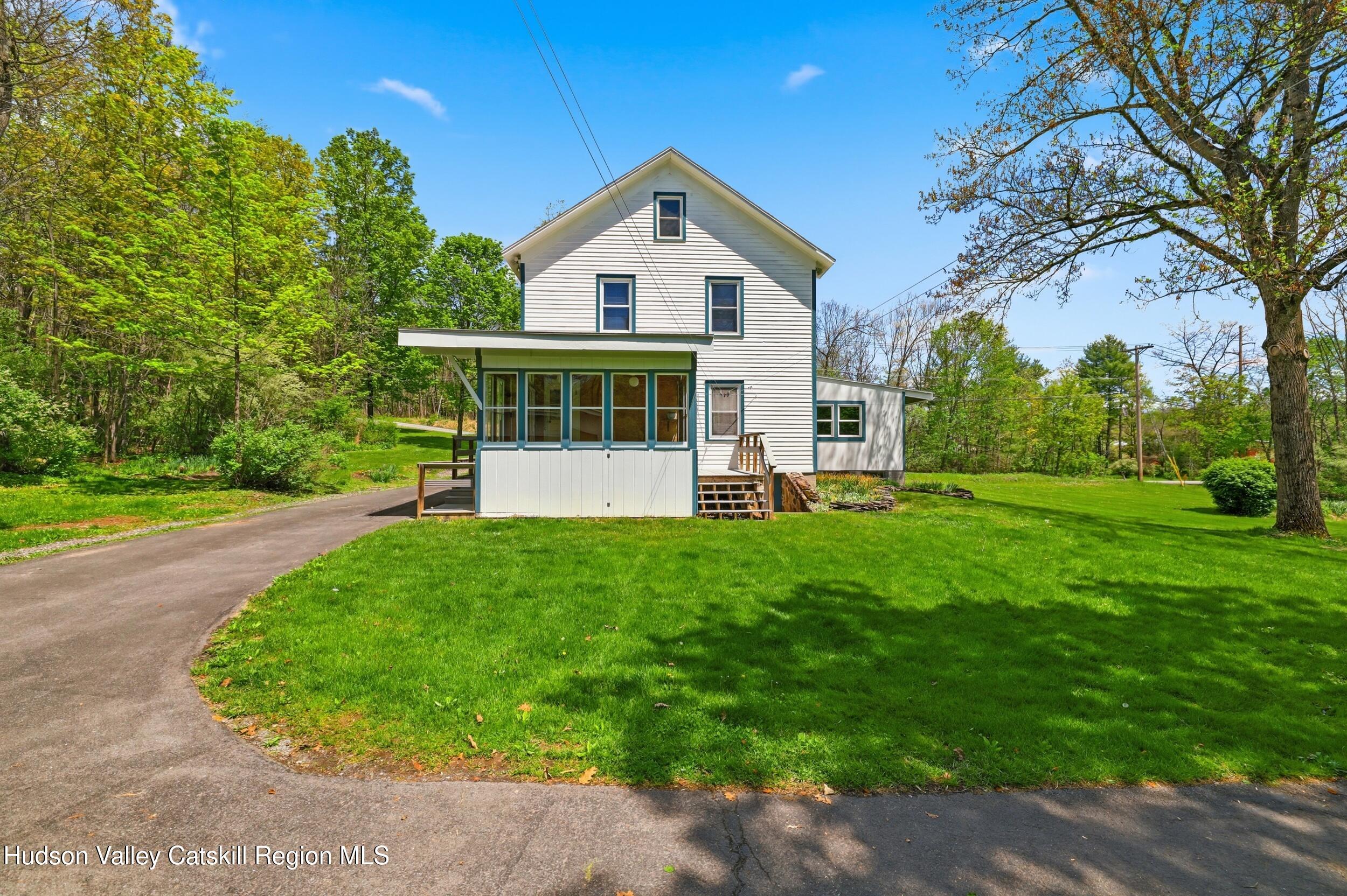 294 Kyserike Road Accord, NY 12404 - Photo 4 of 46 a front view of a house with a yard and green space