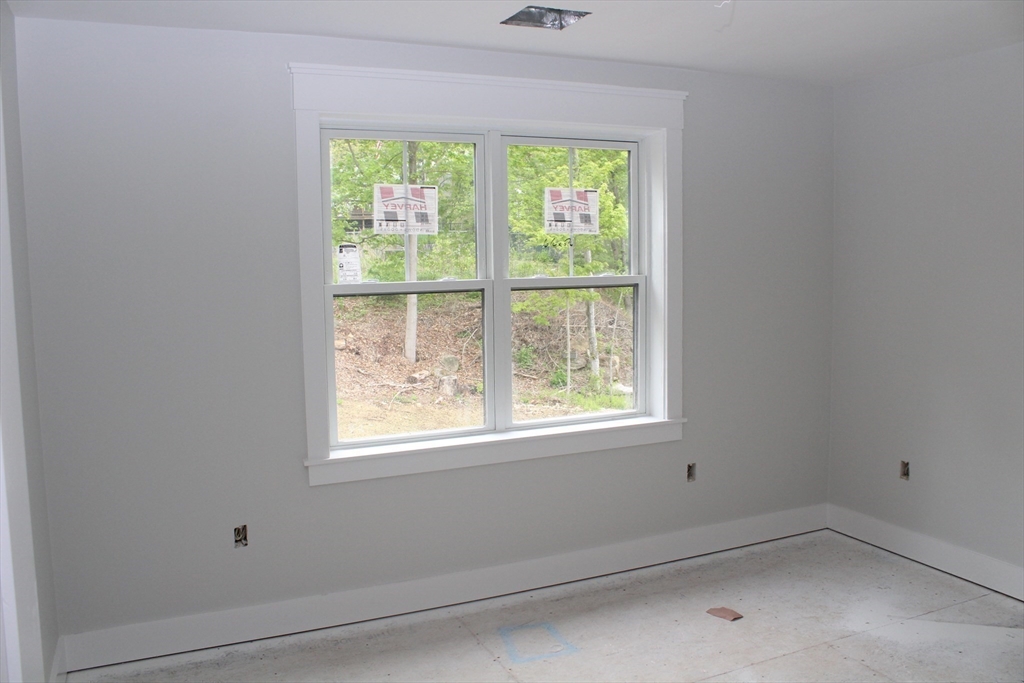 30 Mendon Street Upton, MA 01568 - Photo 25 of 26 an empty room with a window