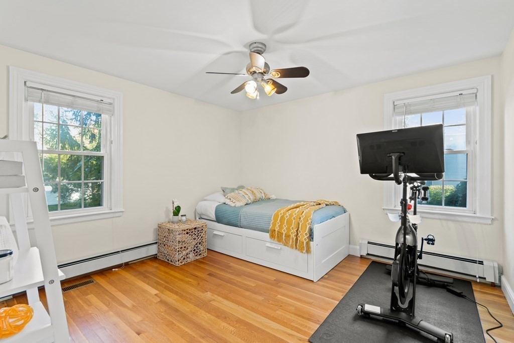 3 Castle Avenue Medfield, MA 02052 - Photo 11 of 36 a living room with furniture and a flat screen tv