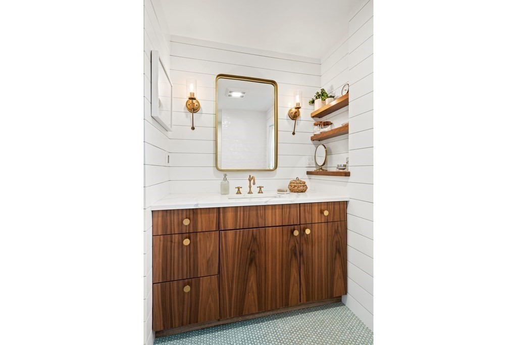 3 Castle Avenue Medfield, MA 02052 - Photo 14 of 36 a bathroom with a sink vanity and mirror