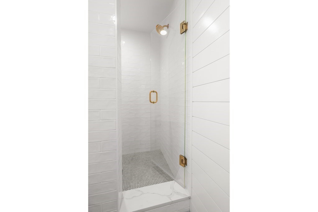 3 Castle Avenue Medfield, MA 02052 - Photo 16 of 36 a bathroom with a shower and a sink