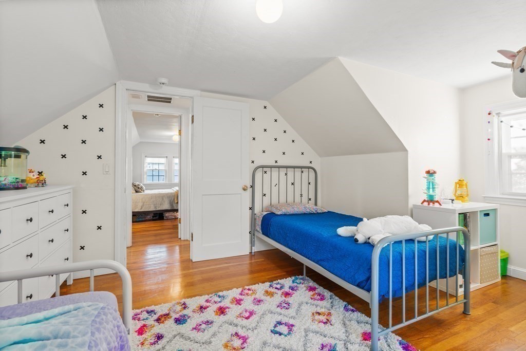 3 Castle Avenue Medfield, MA 02052 - Photo 22 of 36 a bedroom with furniture and a table