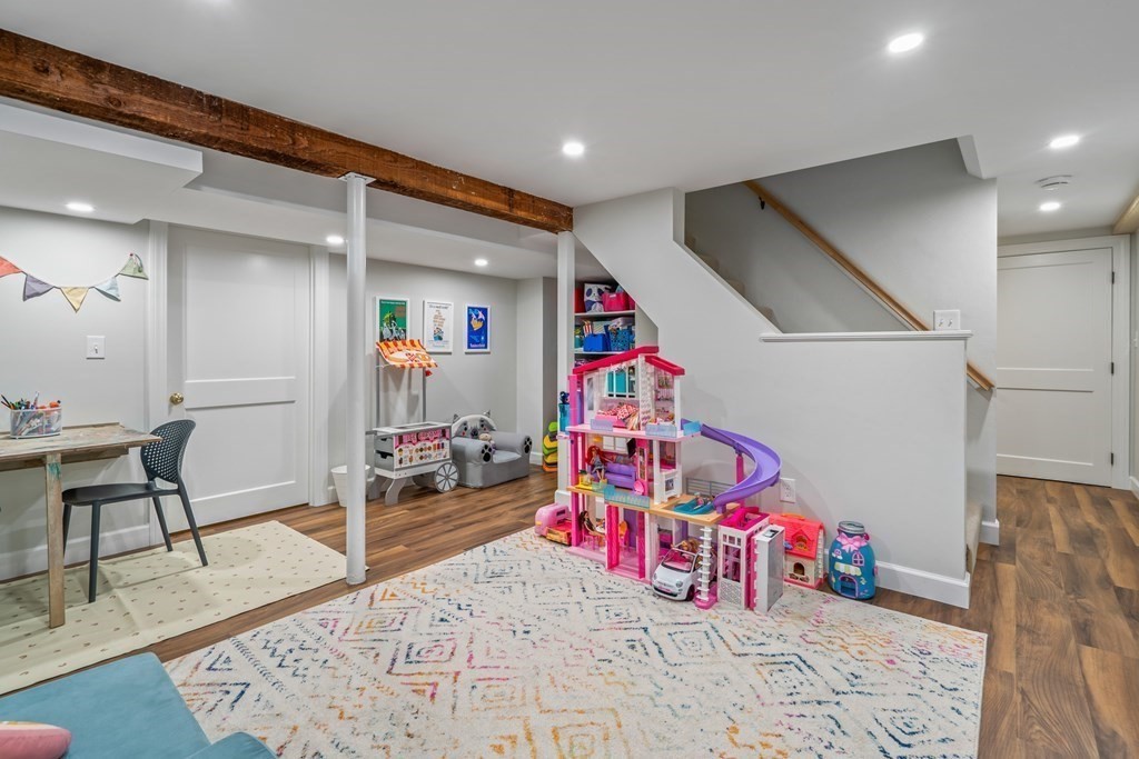 3 Castle Avenue Medfield, MA 02052 - Photo 24 of 36 a bedroom with furniture and wooden floor