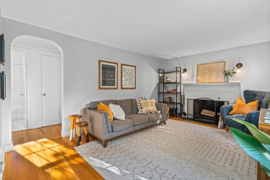 3 Castle Avenue Medfield, MA 02052 - Photo 3 of 36 a living room with furniture and a fireplace
