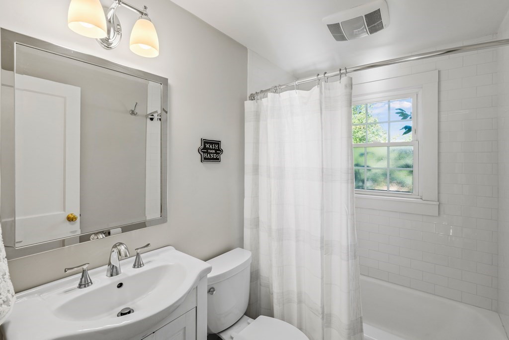 3 Castle Avenue Medfield, MA 02052 - Photo 10 of 36 a bathroom with a sink toilet and shower