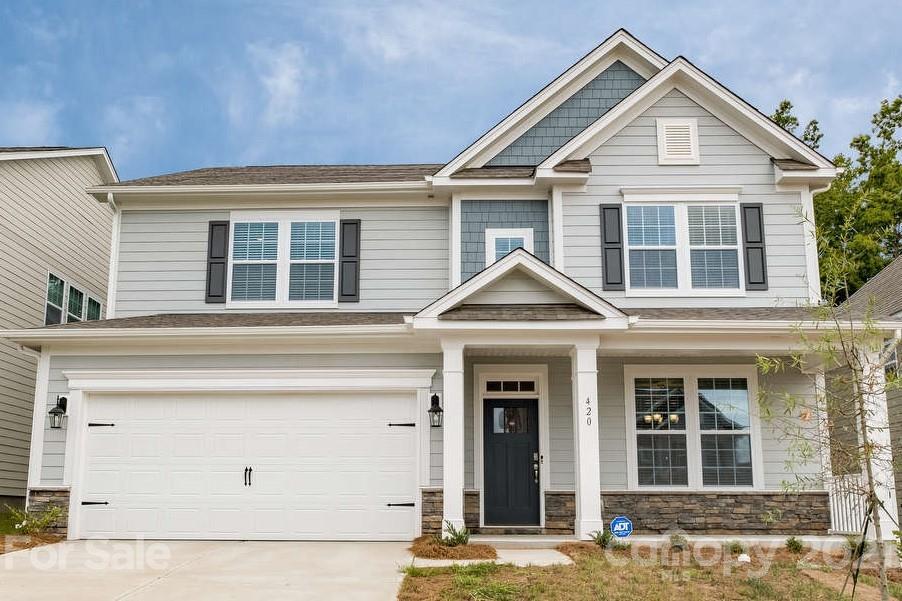 420 Preston Road Mooresville, NC 28117 - Photo 2 of 39 front view of a house with a yard