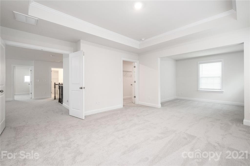 420 Preston Road Mooresville, NC 28117 - Photo 19 of 39 an empty room with windows and closet