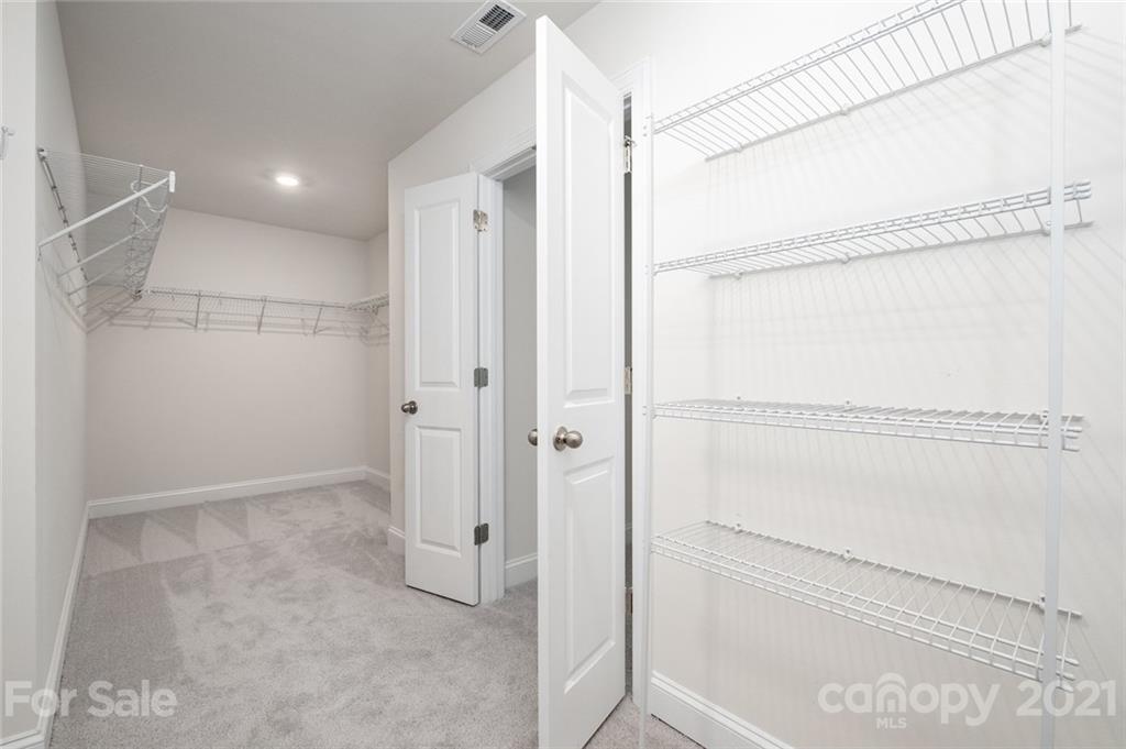 420 Preston Road Mooresville, NC 28117 - Photo 22 of 39 a bathroom with a shower and a glass door