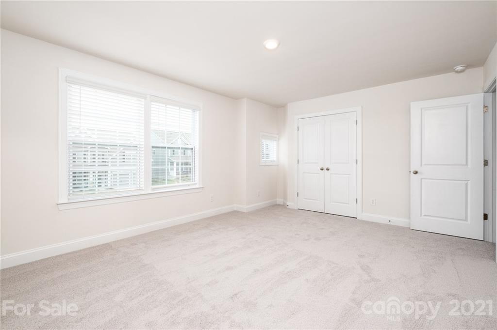 420 Preston Road Mooresville, NC 28117 - Photo 27 of 39 an empty room with windows