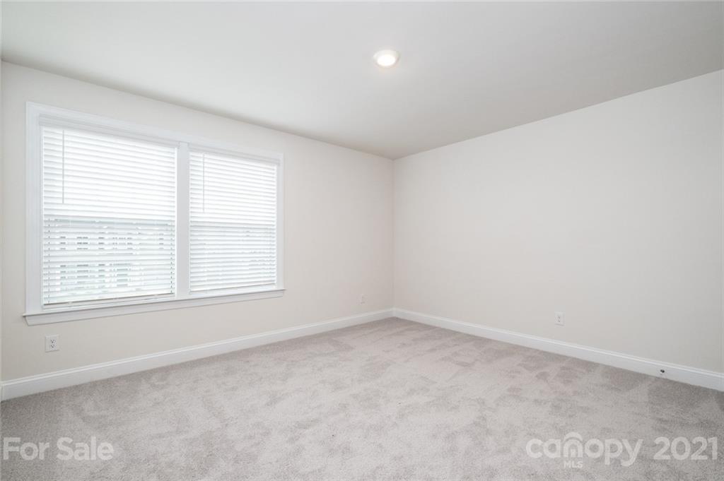 420 Preston Road Mooresville, NC 28117 - Photo 29 of 39 an empty room with a window