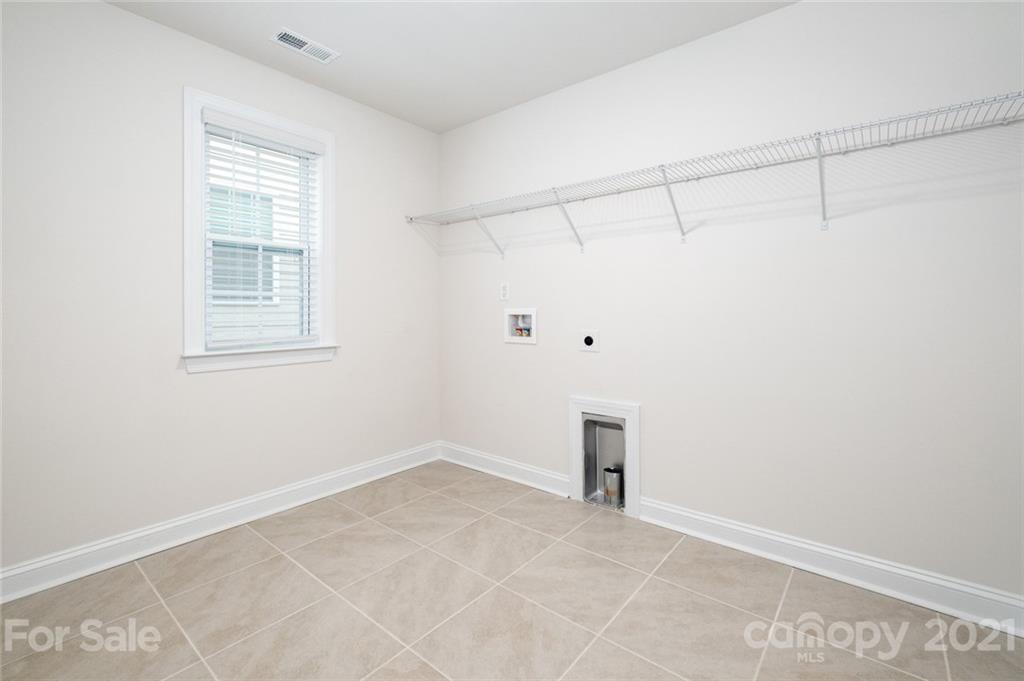 420 Preston Road Mooresville, NC 28117 - Photo 32 of 39 a view of an empty room with a window
