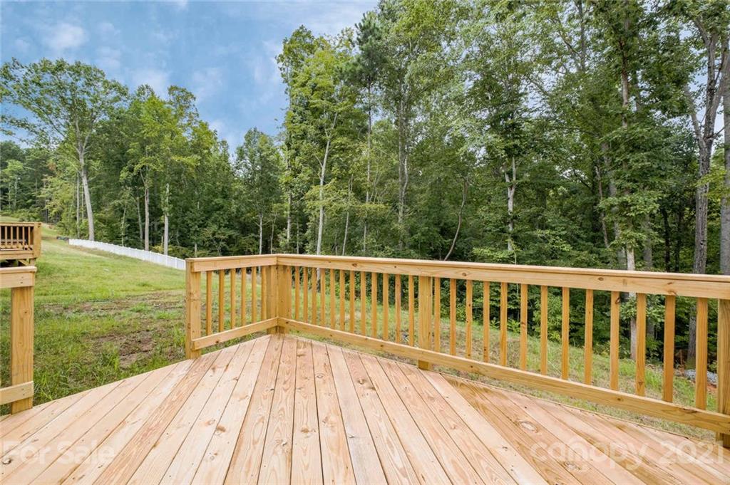420 Preston Road Mooresville, NC 28117 - Photo 33 of 39 a view of balcony with wooden floor and fence